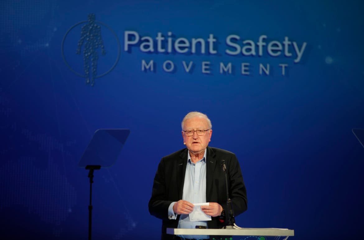 dr ramsey at podium in world patient safety summit